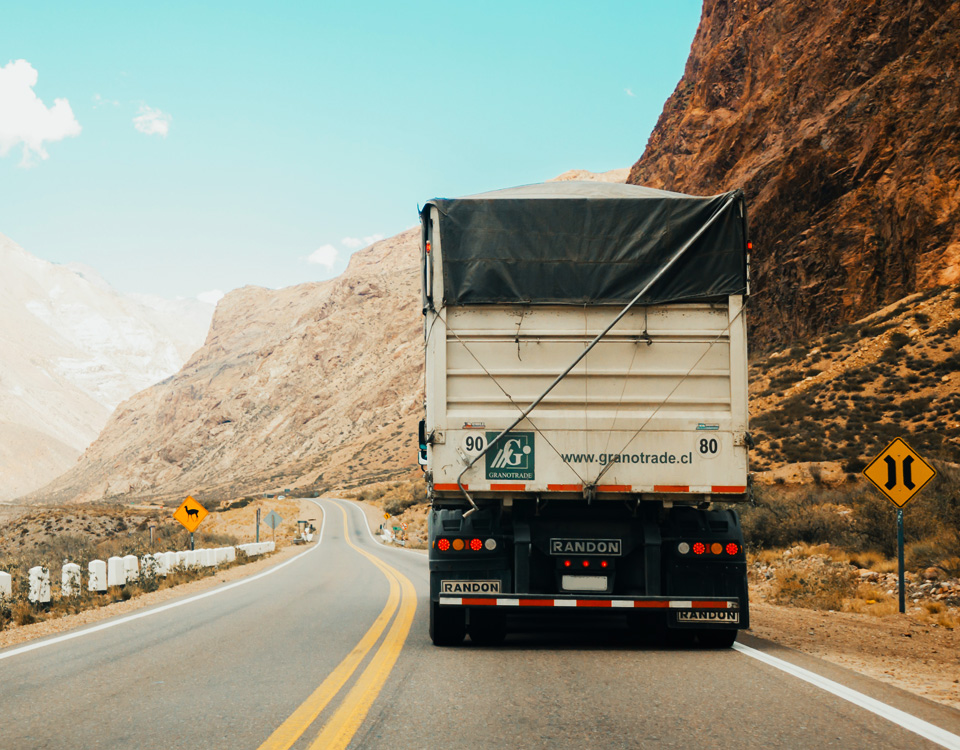 Heavy duty truck driving in the desert